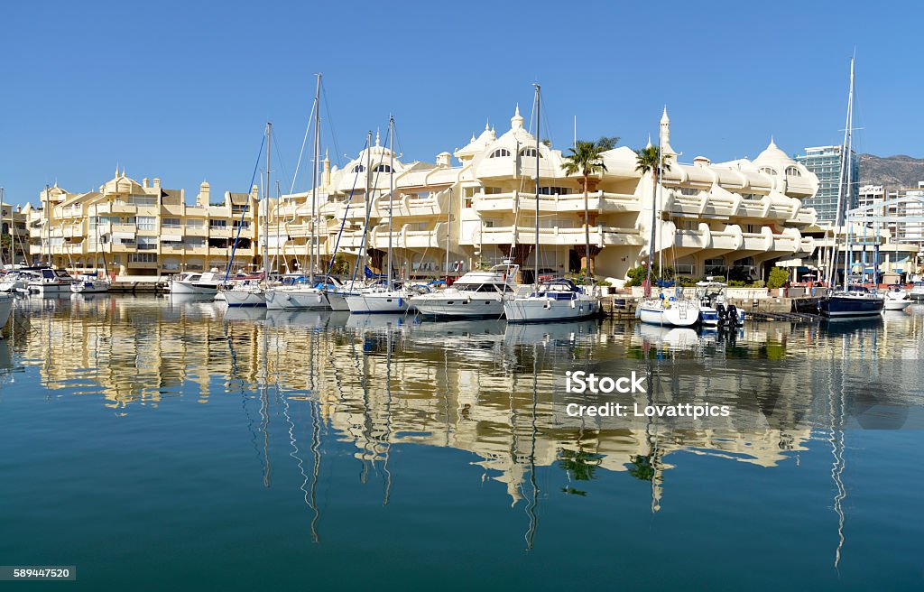 Benalmadena port area. Spain Some of the beautiful apartments and boats moored up in Benalmadena port area. Benalmadena is a large town near Malaga on the Costa del sol Andalucia Spain. Andalusia Stock Photo