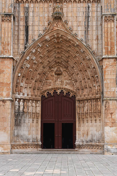 Monastery of Santa Maria Vitoria in Batalha; Portugal Main entrance of the Monastery of Santa Maria Victoria in Batalha, Centro region, Portugal batalha stock pictures, royalty-free photos & images