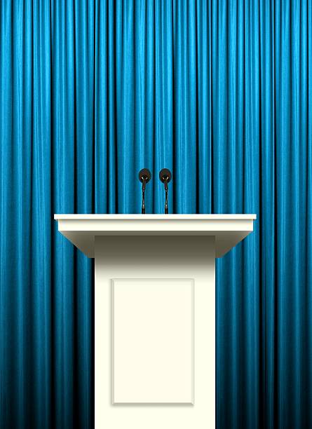 white podium over blue curtain background - podium lectern microphone white imagens e fotografias de stock