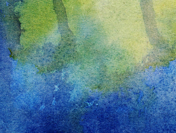 istock Green and blue blended watercolor and ink background 589455776