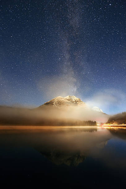 istock Milky way mountain lake 589456020