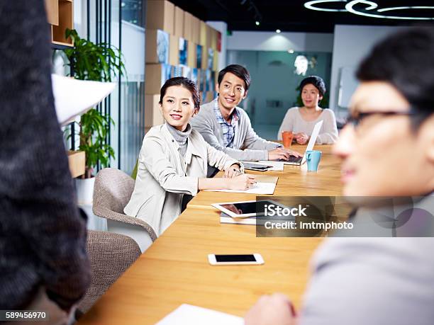 Young Asian Businesspeople Meeting In Office Stock Photo - Download Image Now - Trainee, Education Training Class, Japanese Ethnicity