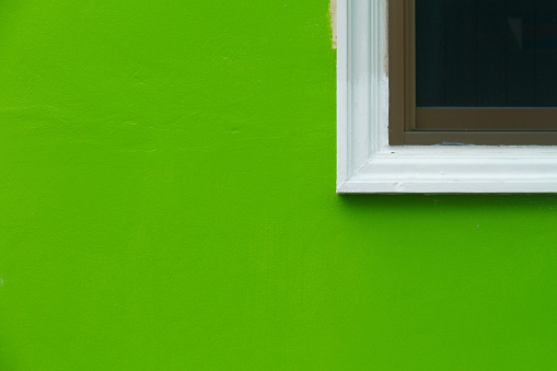 green wall and window frame