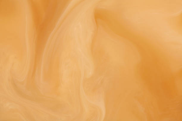 istock coffee milk mixing texture background #2 589460172