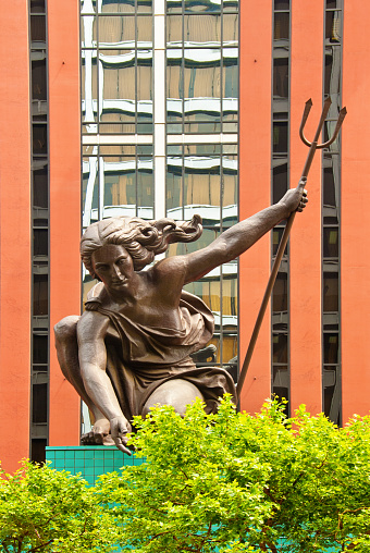 Portland, US - July 2, 2008: The statue of Portlandia above the front entrance of Portland Municipal Services Building, an icon of postmodern architecture.
