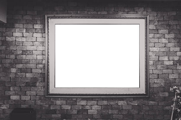 istock Blank antique picture frame on brick wall, vignetting around 589461948