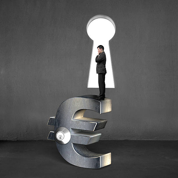 istock Thinking businessman standing on silver Euro sign with lock 589539104