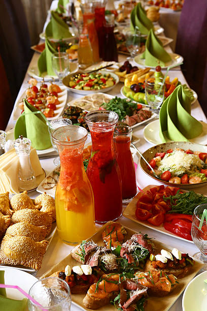 istock restaurant long table served with snack food drink 589539570