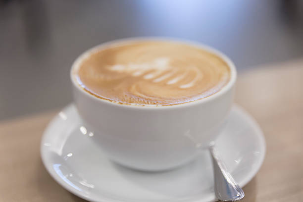 istock hot cappuccino coffee with latte art 589539988