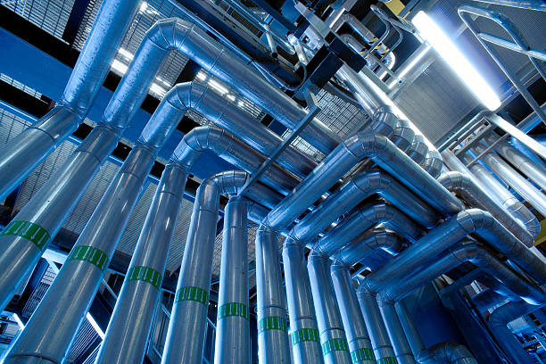 istock Industrial zone, Steel pipelines in blue tones 589540868