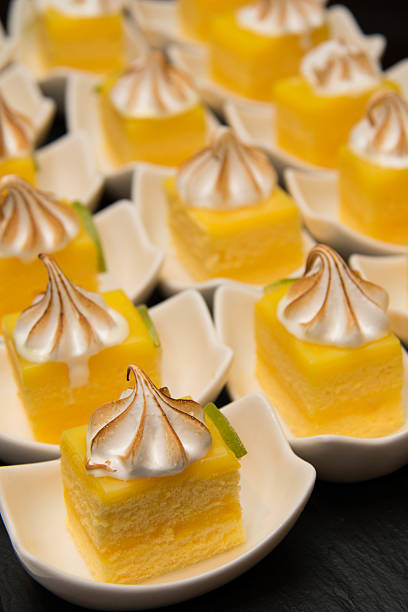 istock Mini lemon meringue cake with cream top 589541262
