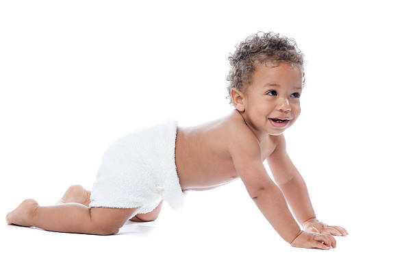 istock Side View Of Baby In A Reuseable, Classic Diaper Crawling 589541502