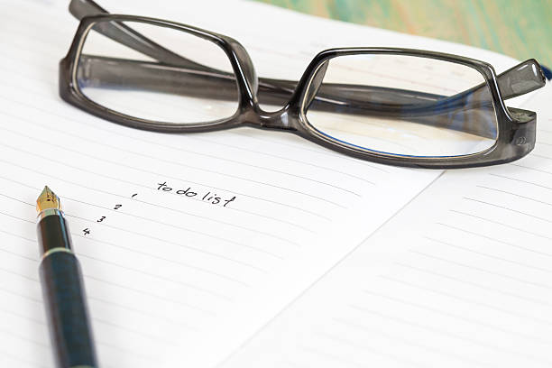 istock writing to do list on notebook page with pen 589544508