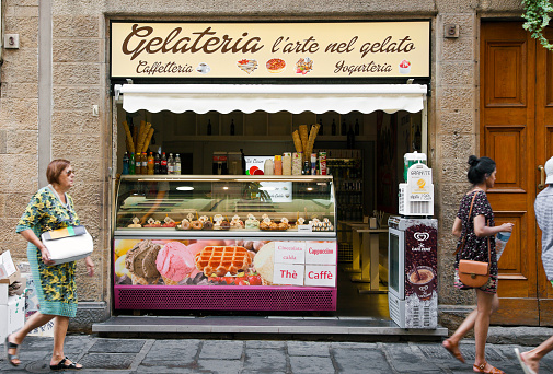 Florence, Italy - July 13, 2016: Street view of gelateria exterior, traditional Italian ice cream shop in Florence, Italy. 