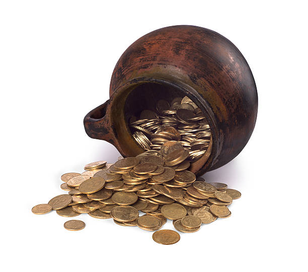 istock Clay pot with antique coins 589551762