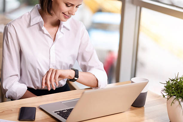 istock Pleasant content woman sitting at the table 589552402