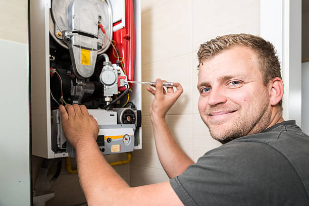 istock Furnace heating maintenance and repair 589554594