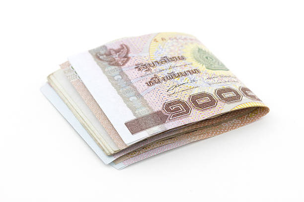 istock Thai Baht on a white background, Thai money stack imag 589555310