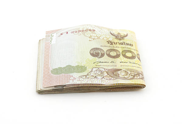 istock Thai Baht on a white background, Thai money stack imag 589555432