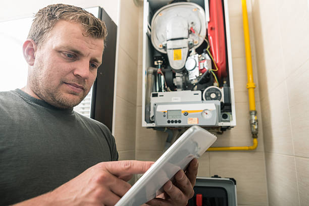 istock Furnace repairman 589555782