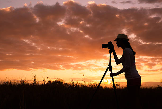 istock Female photographer 589560900