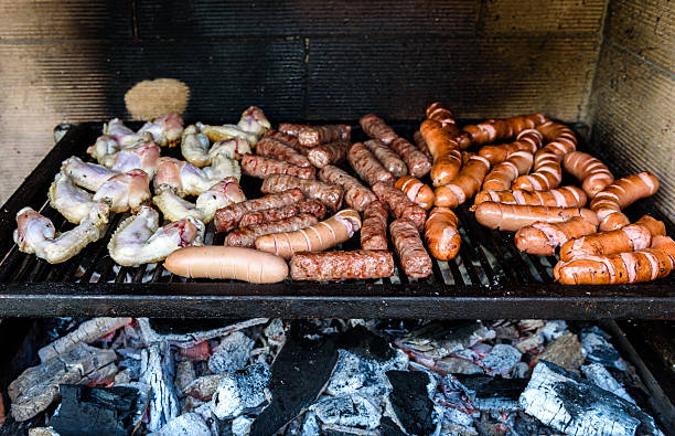 istock Mixed Meat on barbecue grill with coal. 589563762