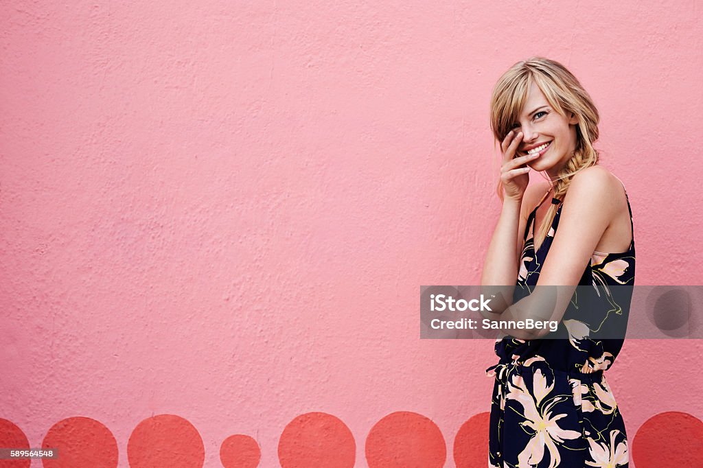 Beautiful woman on pink Beautiful woman in portrait on pink Portrait Stock Photo