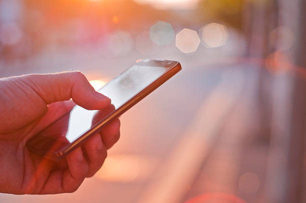 istock Man using mobile smartphone. Businessman hand using a smart phone 589564616