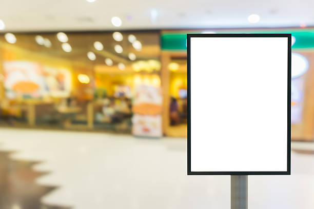 istock Blank sign for your text message in modern shopping mall. 589565034
