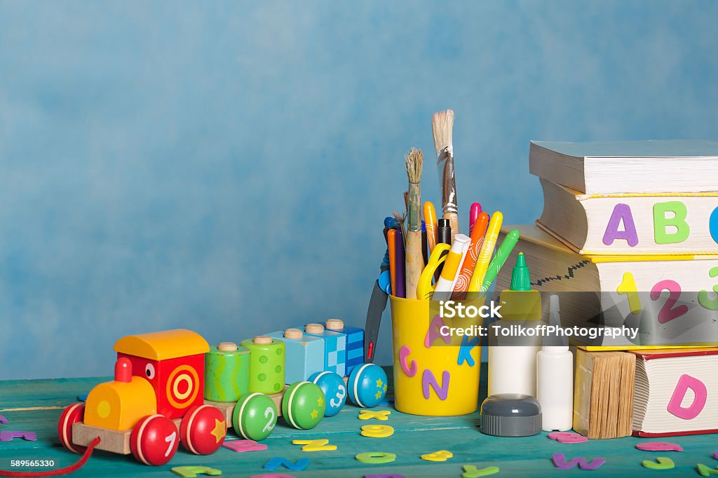 Back to school background Back to school stationery is on the table.Blue sky coloured background Toy Stock Photo
