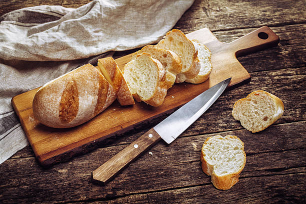 istock The baguette slices on a cutting board 589566380