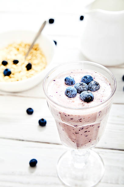 istock Healthy breakfast with blueberry smoothie and oatmeal 589570150