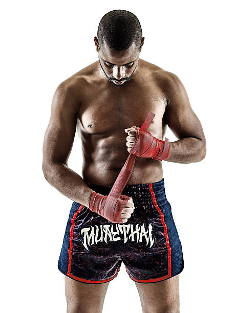 one caucasian Muay Thai kickboxing kickboxer thai boxing man isolated on white background