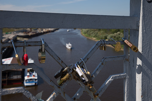 Fasten locks on the bridge of lovers