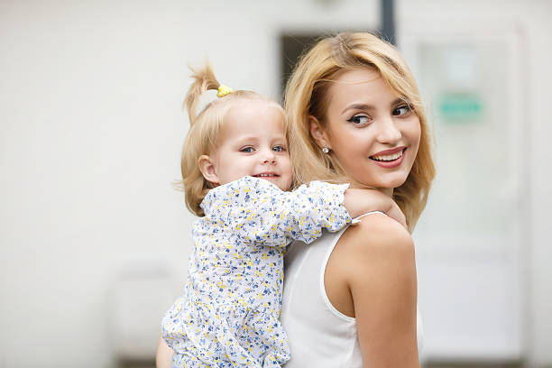 istock Sweet childhood with mom 589573040