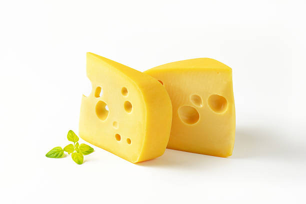 istock wedges of yellow cheese with eyes 589578282