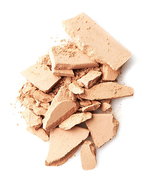 istock Cracked Face powder on background 589578460