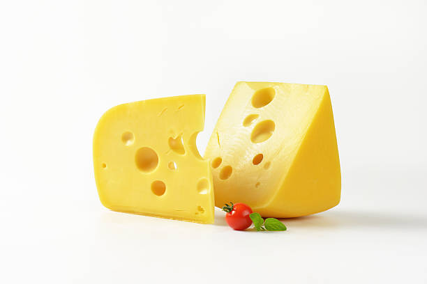istock wedges of yellow cheese with eyes 589579704