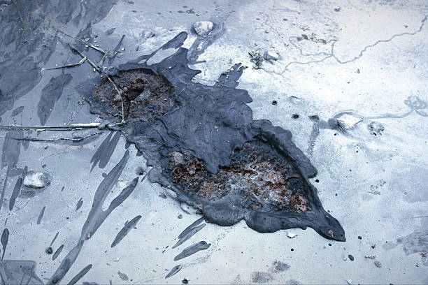 istock Worker Footprint on the dirty cement ground. 589580198
