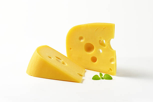 istock wedges of yellow cheese with eyes 589580424