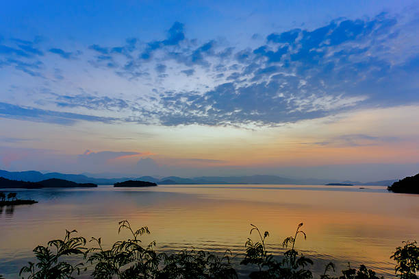 istock Colorful sunset over the water at Dam 589581816