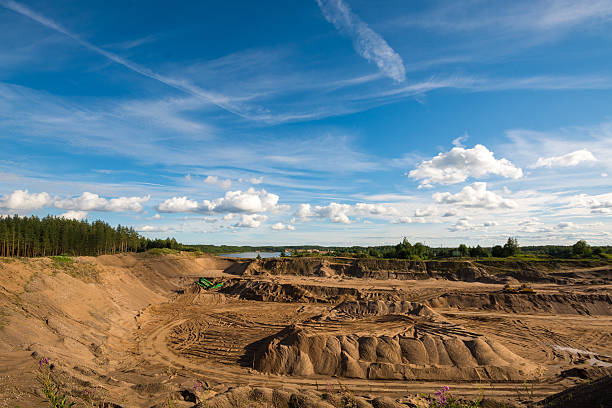 istock Lake in quarry. Blue sky with clouds. 589583322