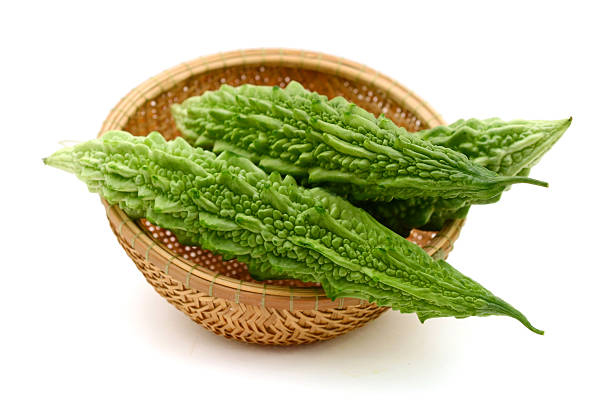 istock Bitter melon or bitter gourd on white background 589583592
