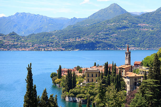 Panorama of Varenna at Lake Como with mountains in Italy Panorama of lakeside village Varenna at Lake Como with mountains in Lombardy, Italy lake como photos stock pictures, royalty-free photos & images