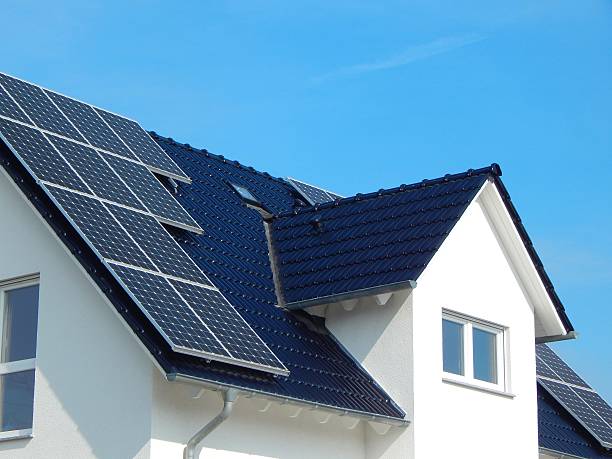 istock Black tile roof with solar panels 589939334