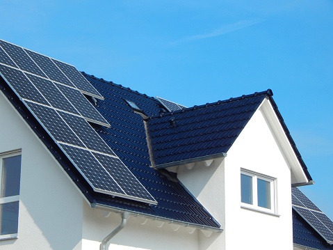 Solar energy: A Black tile roof with solar panels