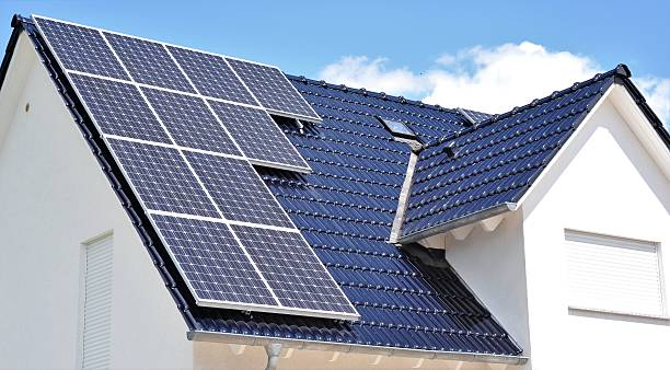 istock Black tile roof with solar panels 589939726