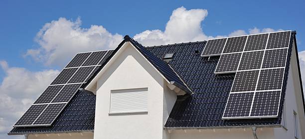 istock Black tile roof with solar panels 589939888