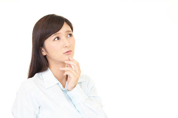 istock Uneasy Asian woman 589940090