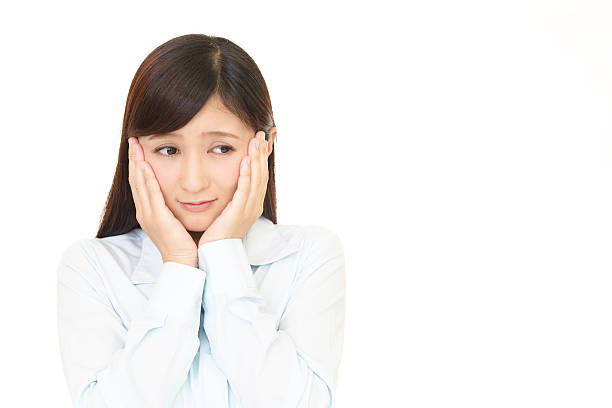 istock Uneasy young woman 589940628